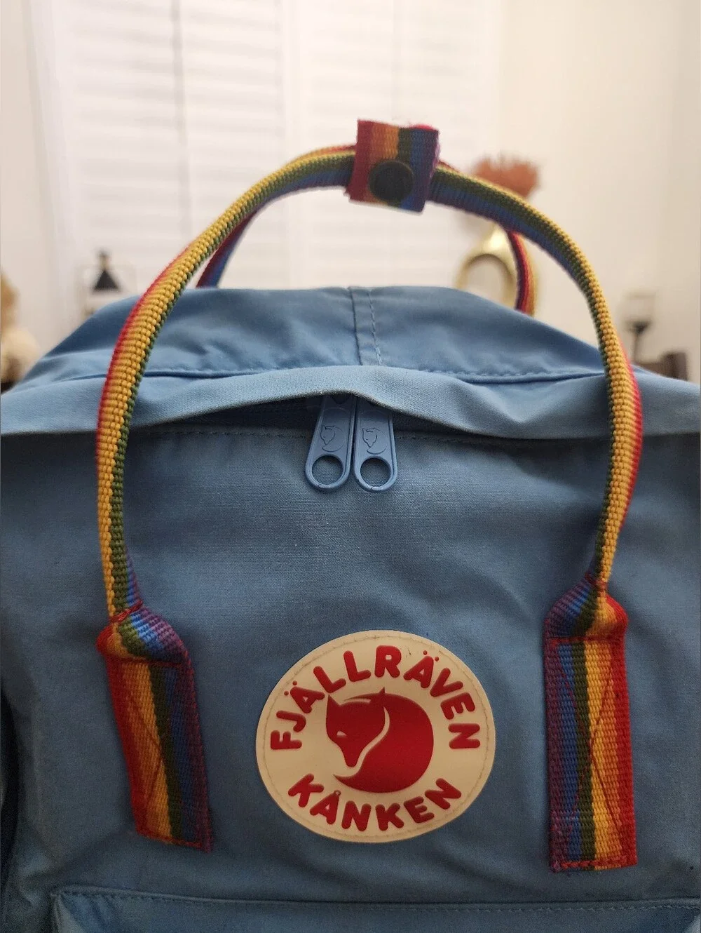 Classic Light Blue Backpack with Rainbow Accents